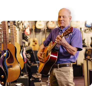 Shannon, a real GLASSIA patient, playing the guitar.